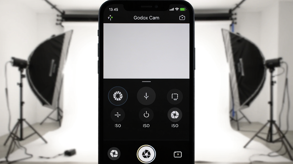 һ����ţ���(Godox Cam)�������ֻ��ϵĽ����ͼ������Ϊǳ��ɫ��Ӱ��ֻ���Ļ��ʾ�������������壬�п��š�ISO����Ȧ�Ȳ�����ť��������רҵ�Ҹɾ������ֱ�ע